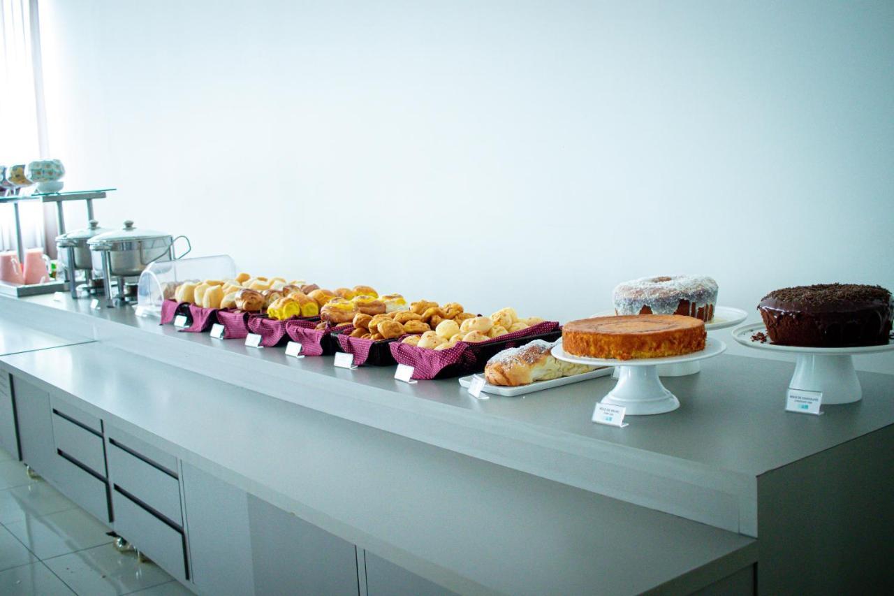 Hotel H2 Congonhas Congonhas (Minas Gerais) Exterior foto A selection of cakes